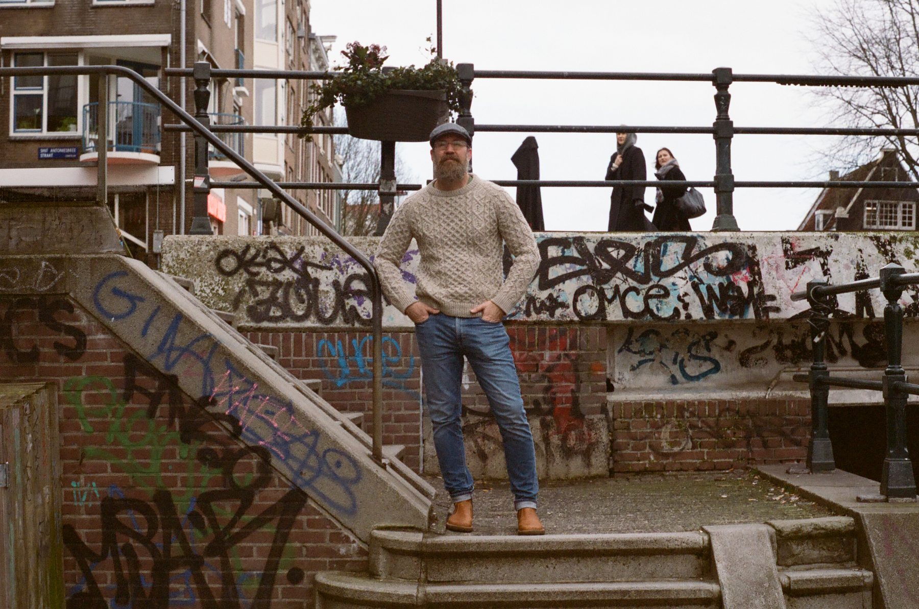 Joseph Lambert standing on canal steps in Amsterdam