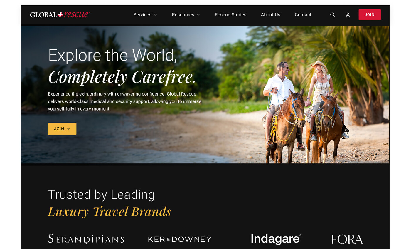Luxury landing page, premium treatment — dark and gold, 'Explore the World, Completely Carefree'